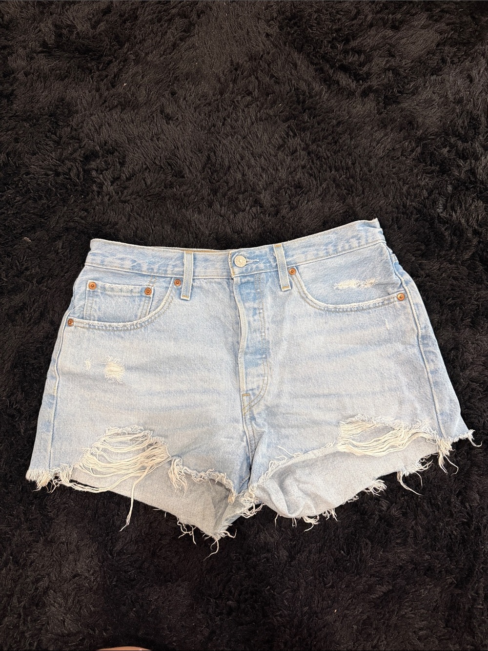 High-Rise Light Blue Distressed Denim Shorts